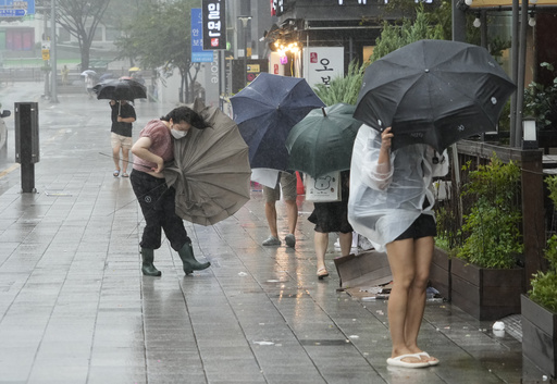 Khanun blows strong winds and heavy rains into South Korea