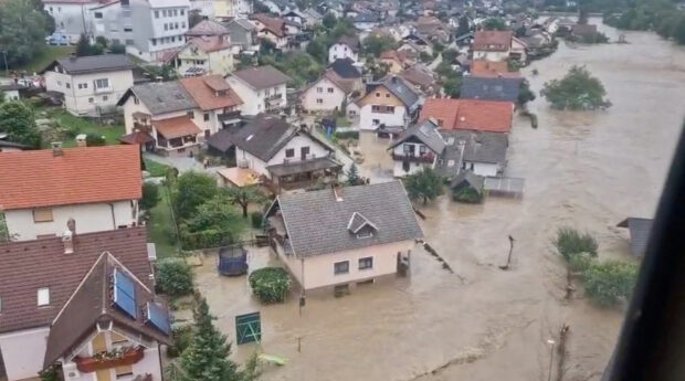 People evacuated by helicopters as floods hit Slovenia
