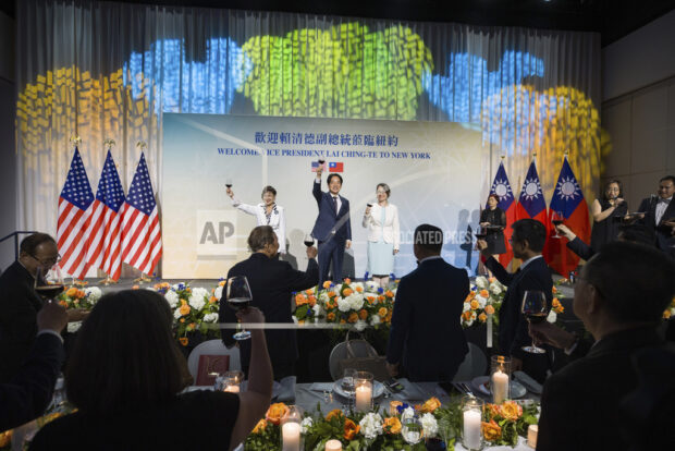 In this photo released by the Taiwan Presidential Office, Taiwan's Vice President William Lai toasts at an event to welcome him to New York on Monday, Aug. 14, 2023. The Chinese military launched drills around Taiwan on Saturday, Aug. 19 as a "stern warning" over what it called collusion between "separatists and foreign forces," its defense ministry said, days after the island's vice president stopped over in the United States. (Taiwan Presidential Office via AP)