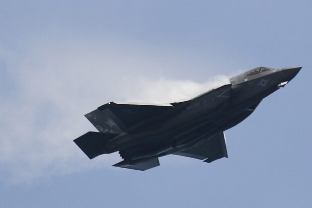 A US Marine Corps F-35B Lightning II, a short takeoff and vertical landing (STOVL) version of the Joint Strike Fighter aircraft, flies past during a preview of the Singapore Airshow in Singapore on February 13, 2022. A stealth-capable US fighter jet vanished on September 17, 2023 -- not from prying eyes but rather from the American military, prompting an unusual call to the public to help locate the missing multimillion-dollar plane. After what authorities labeled a "mishap," a pilot flying an F-35 in the southern state of South Carolina on Sunday afternoon ejected from the craft. The pilot survived, but the military was left with an expensive problem: it couldn't find the jet, leading Joint Base Charleston to ask for help from local residents. (Photo by Roslan RAHMAN / AFP)