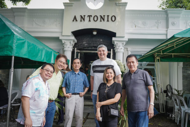 A group photo of some of the friends and family members who attended the 10th year death anniversary commemoration of Tonton. 