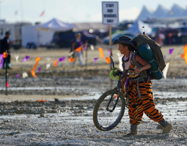One death was reported at Burning Man as thousands stranded in the mud