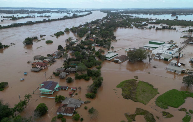 A cyclone batters Brazil killing at least a dozen people and flooding homes