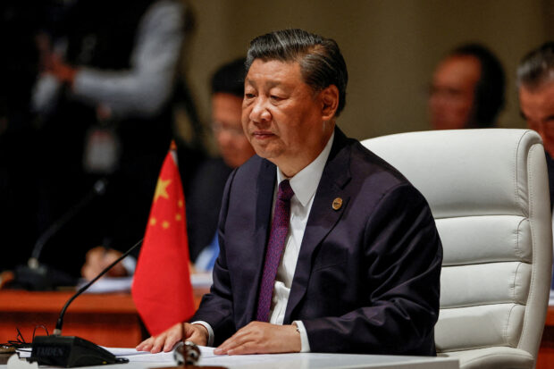 Chinese President Xi Jinping attends the plenary session of the 2023 BRICS Summit at the Sandton Convention Centre in Johannesburg, South Africa on August 23, 2023. GIANLUIGI GUERCIA/Pool via REUTERS/File Photo