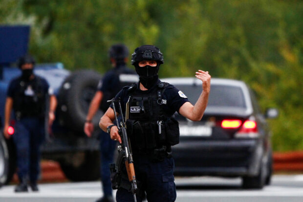 Serb gunmen battle police in Kosovo monastery siege resulting in the death of four people