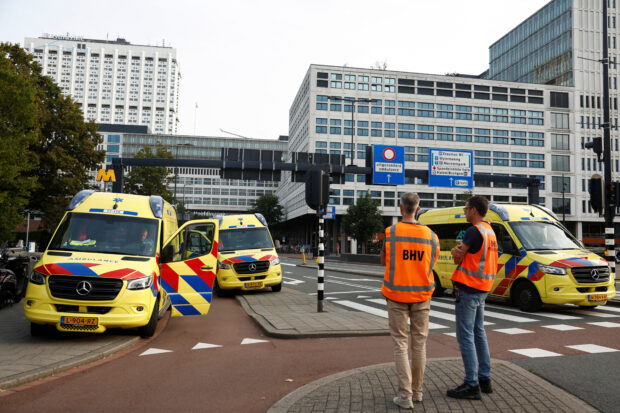 Ambulances are seen after Dutch police arrested a suspect after a shooting in Rotterdam, Netherlands, September 28, 2023. REUTERS/Piroschka van de Wouw