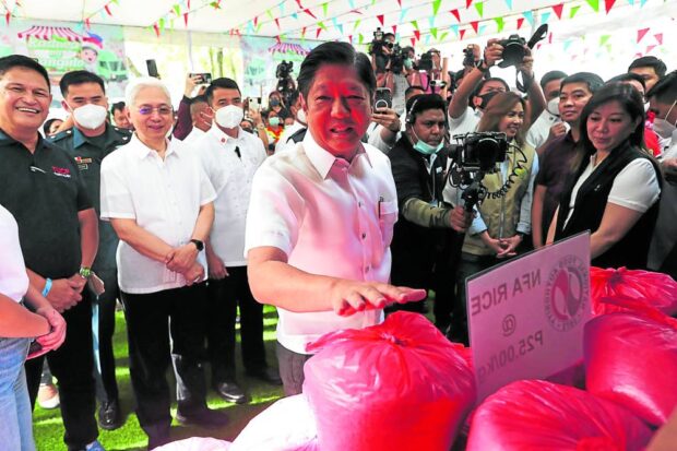 AFFORDABLE COMMODITIES In this photo taken on March 8, President Marcos launches a Kadiwa outlet at the Trade Union Congress of the Philippines compound in Quezon City to sell basic food items at lower prices. On Friday, to make rice more affordable, he ordered price caps of P41 and P45 per kilo of regular milled and well-milled rice following an “alarming” increase in prices. —NIÑO JESUS ORBETA