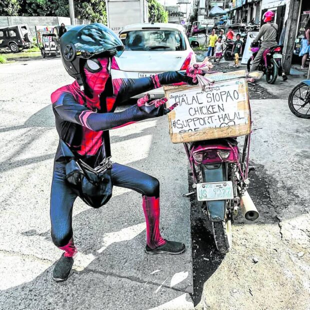 As an added gimmick for his halal “siopao” business, Sayyid Sha-rif Ledesma Daham dons a Spider-Man costume to better attract customers. The United States Agency for International Development (USAID) counts him as a partner in its livelihood training program for out-of-school youths.