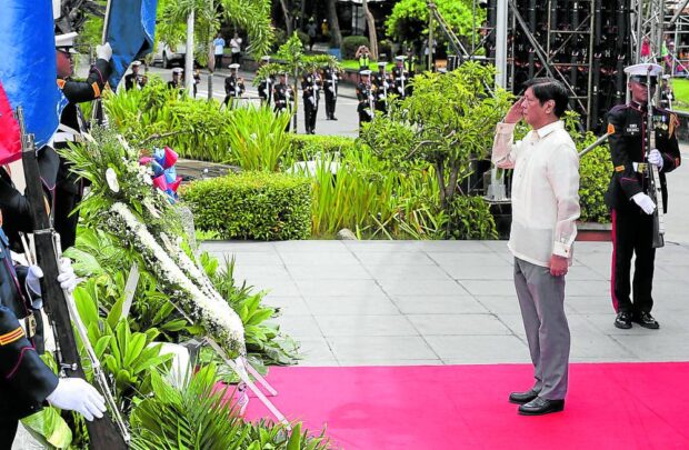 HONOR THY FATHER President Marcos lays a wreath at the monument of his father and namesake in Batac, Ilocos Norte, on Monday, in commemoration of the latter’s 106th birth anniversary. NIÑO JESUS ORBETA