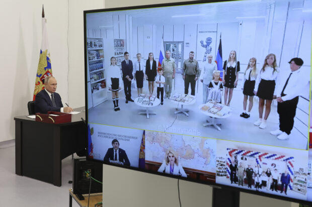 Russian President Vladimir Putin attends an opening ceremony of new educational institutions in five regions of the country, via a video link in Solnechnogorsk, Moscow region, Russia, Friday, Sept. 1, 2023. (Mikhail Klimentyev, Sputnik, Kremlin Pool Photo via AP)