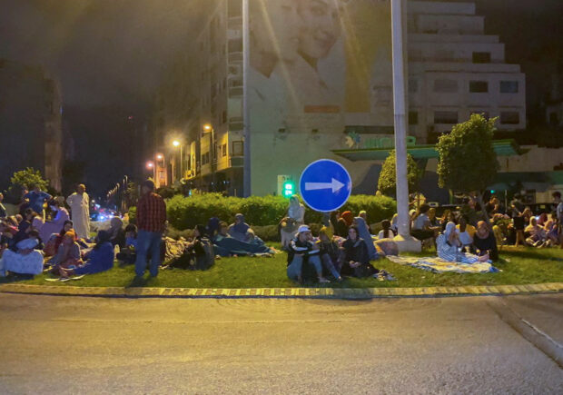 People gather on a street in Casablanca, following a powerful earthquake in Morocco
