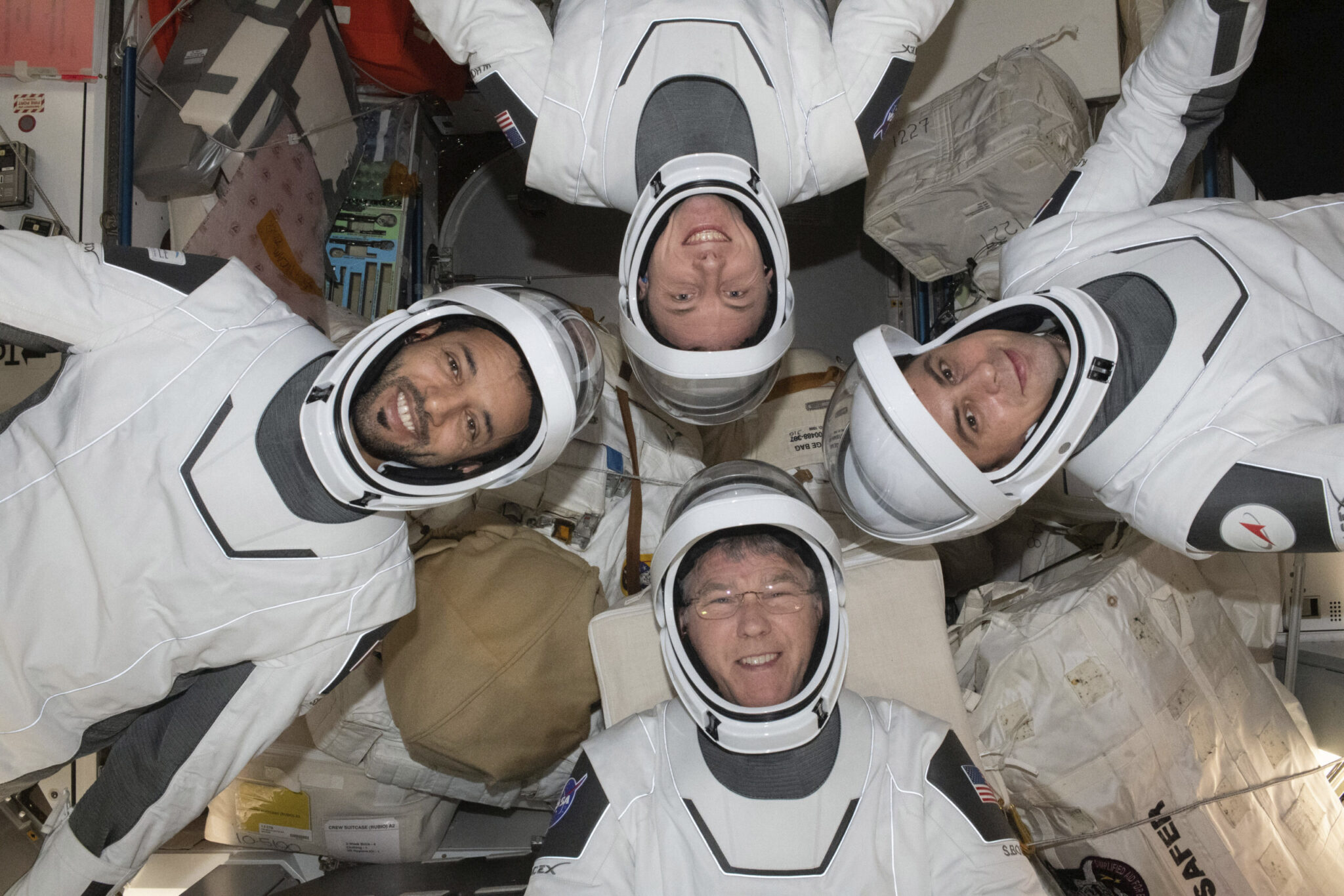 Four astronauts return to Earth in SpaceX capsule to wrap up sixmonth