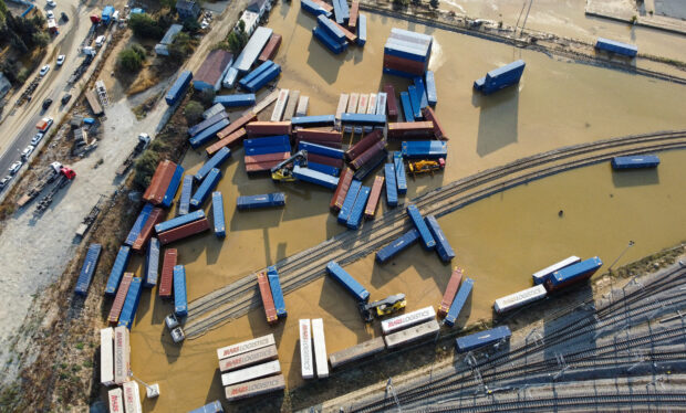 Strewn containers are seen in flooded waters after heavy downpours in Istanbul