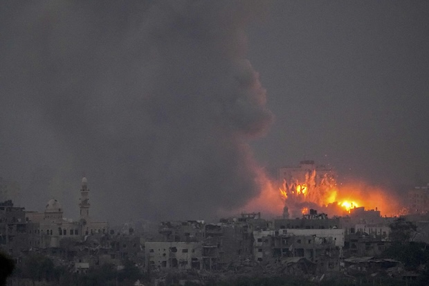 Smoke and fire rise following an Israeli airstrike in the Gaza Strip