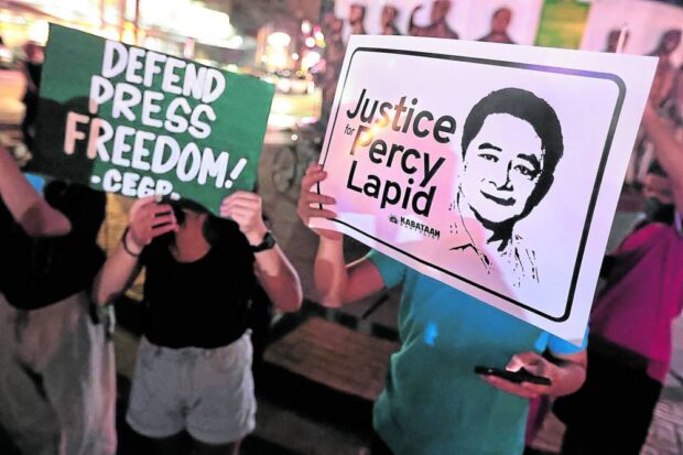 APPEAL In this Oct. 4, 2022, photo, activists and peace advocates stage an indignation rally in Quezon City to condemn the murder of broadcaster Percival “Percy Lapid” Mabasa. His relatives and their supporters have continued to cry out for justice as they mark Mabasa’s first death anniversary on Tuesday. —GRIG C. MONTEGRANDE 