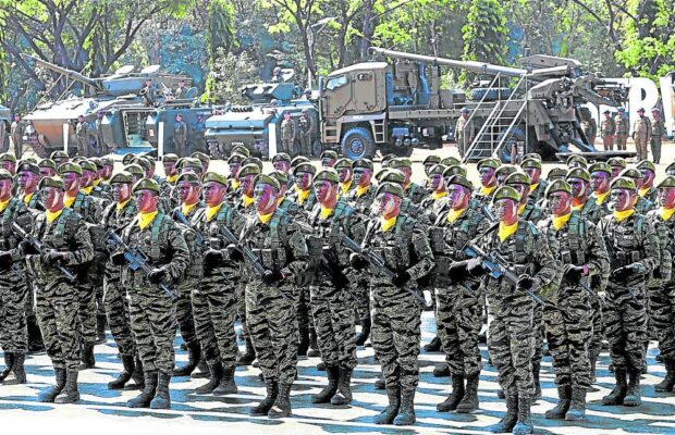 MARCHING ORDER In this file photo, troops from the Philippine Army listen as President Marcos speaks during the 126th founding anniversary of the Philippine Army in Fort Bonifacio. —FILE PHOTO