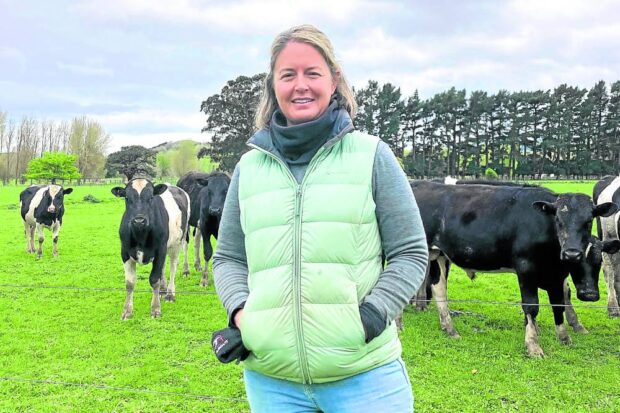 PRICE OF EMISSIONS Kate Wyeth, a sheep and beef farmer in Wellington, New Zealand, is among those to be affected by a government tax plan that can also influence the rural community vote in Saturday’s general elections. —AFP