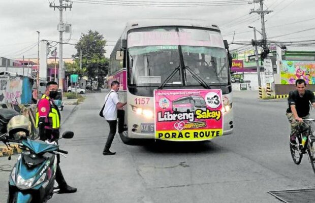 FREE RIDE A bus deployed by the Angeles City government offers ride to stranded commuters following the strike staged by some local groups of jeepney operators and drivers on Monday. PHOTO COURTESY OF ANGELES CITY GOVERNMENT