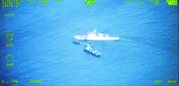 ‘DANGEROUS, IRRESPONSIBLE’   In this screenshot of a video taken by the Armed Forces of the Philippines some 2 kilometers east of Ayungin (Second Thomas) Shoal, China Coast Guard Vessel No. 5203 blocks a boat contracted by the AFP for a resupply mission on Sunday morning in that area of the West Philippine Sea.