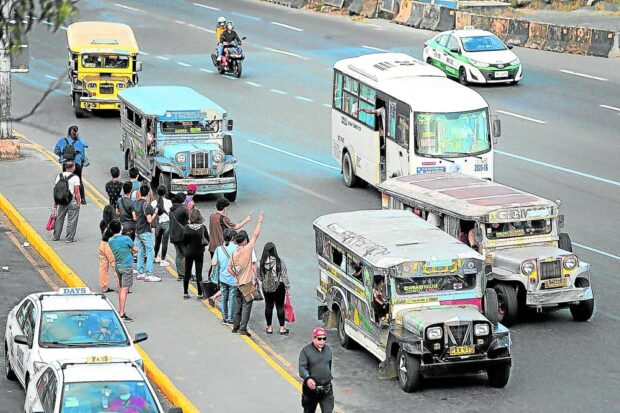 BACK ON THE ROAD / MARCH 7, 2023 Traditional jeepneys ply their route along Philcoa in Commonwealth Avenue in Quezon CIty on Tuesday, March 7, 2023 as the second day of the transport strike by some transport group are stil on-going. INQUIRER PHOTO / GRIG C. MONTEGRANDE