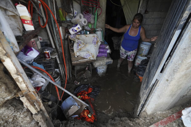 Elizabeth Morales show the damaged to her home after Hurricane Otis ripped through Acapulco, Mexico, Thursday, Oct. 26, 2023