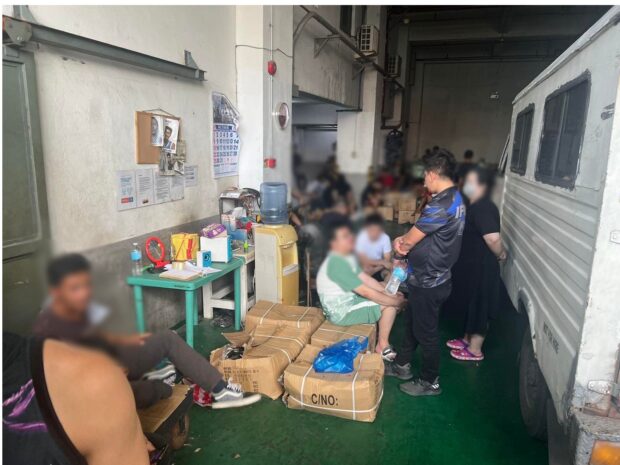 BOC: 77 arrested for theft in padlocked Pasay warehouse