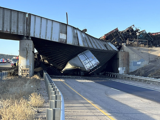 Train derailment collapses Colorado bridge, killing truck driver