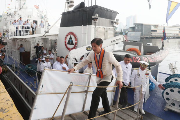 October 17 2023President Ferdinand Marcos Jr. with Phil. Coast Guard commandant Artemio Abu boards the BRP Malabrigo, which usually patrols the West Phil Sea during the 122th Founding anniversary of the Philippine Coast Guard on tuesday. Last October 13, another incident of a chinese vessel shadowing a Phil. navy boat was reported southwest of Pag-Asa island. INQUIRER/ MARIANNE BERMUDEZ