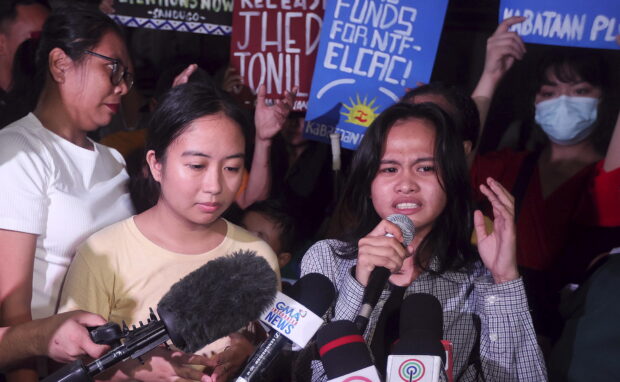 Environmental activists Jhed Tamano (in yellow shirt) and Jonila Castro issue a short statement to the media after meeting with human rights officials on Tuesday, Sept. 19, 2023 at the Commission on Human Rights headquarters in Quezon CIty after a press conference by the NTF-ELCAC in Bulacan.