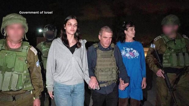 This handout picture courtesy of the government of Israel taken on October 20, 2023 shows Natalie Shoshana Raanan (2nd L) and Judith Tai Raanan (2nd R) after being held hostage and later released by Hamas at an undiclosed location.