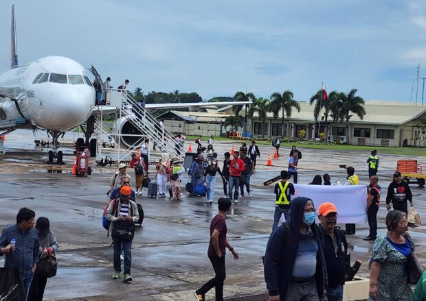 FIRST BATCH Passengers of the first Philippine Airlines flight from Manila land at Cotabato Airport in Datu Odin Sinsuat, Maguindanao del Norte, which resumed its commercial flights on Oct. 1. —PHOTO COURTESY OF ROSSLAINI ALONTO-SINARIMBO