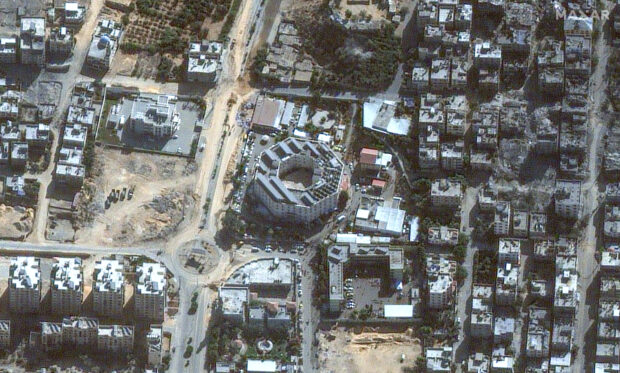 This handout satellite picture released by Maxar Technologies on November 12, 2023, shows the damage around the Indonesian Hospital in Beit Lahia in the Gaza Strip. More than 10,000 people have been killed in relentless Israeli bombardment of the Gaza Strip, according to the Hamas-run health ministry, since the war erupted after Palestinian militants raided southern Israel on October 7 killing at least 1200 people, according to official Israeli figures. (Photo by Satellite image ©2023 Maxar Technologies / AFP) / RESTRICTED TO EDITORIAL USE - MANDATORY CREDIT "AFP PHOTO / Satellite image ©2023 Maxar Technologies" - NO MARKETING NO ADVERTISING CAMPAIGNS - DISTRIBUTED AS A SERVICE TO CLIENTS - THE WATERMARK MAY NOT BE REMOVED/CROPPED -