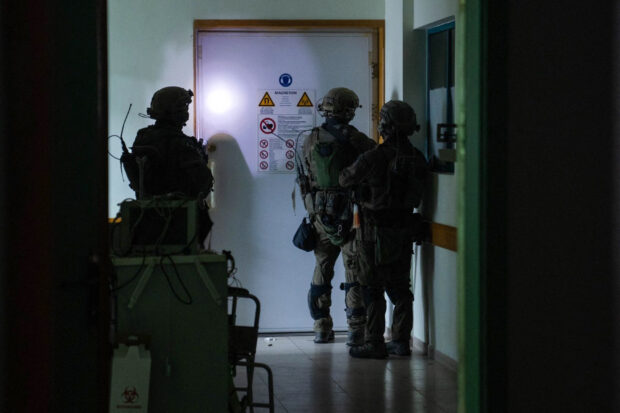 This handout picture released by the Israeli army on November 15, 2023, reportedly shows Israeli soldiers carrying out operations inside Al-Shifa hospital in Gaza City, amid continuing battles betweeen Israel and the Palestinian militant group Hamas. (Photo by Israeli Army / AFP) / RESTRICTED TO EDITORIAL USE - MANDATORY CREDIT "AFP PHOTO / ISRAELI ARMY " - NO MARKETING NO ADVERTISING CAMPAIGNS - DISTRIBUTED AS A SERVICE TO CLIENTS