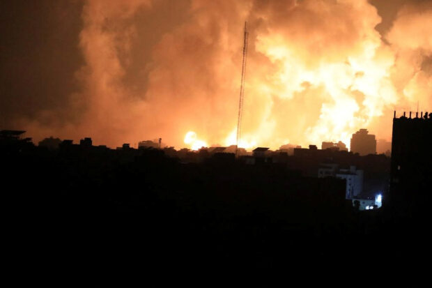 Smoke and flames rise during Israeli strike, amid the ongoing conflict between Israel and Palestinian Islamist group Hamas, in Gaza City November 5, 2023. REUTERS/Mohammed Al-Masri