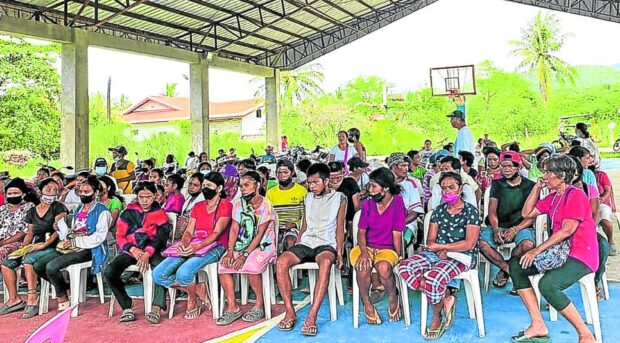 PHOTO: Beneficiaries of the Pantawid Pamilyang Pilipino Program, or 4Ps, wait for their turn to receive financial assistance. STORY: DBM: 4Ps budget for 2024 is P106.3 billion 