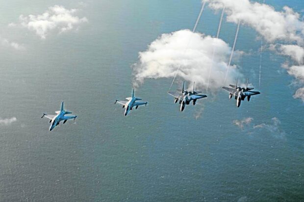 PHOTO: File photo of fighters jets flying in formation STORY PAF: PH-US joint air patrol ‘no way directed toward any country’