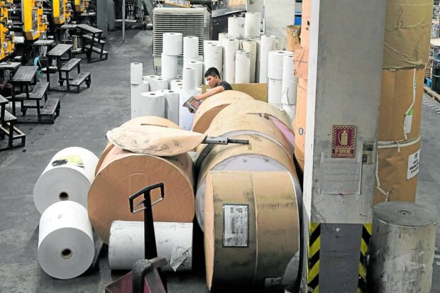 CALL FOR REFORMS The Pulp and Paper Manufacturers Association of the Philippines (Pulpapel) is alarmed by the 125-percent spike in the importation of paper products since early last year. Photo shows the inside of a Makati City-based printing plant. —INQUIRER FILE PHOTO