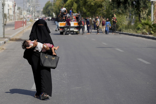 Civilians fleeing northern Gaza's combat zone report terrifying journey on foot past Israeli tanks