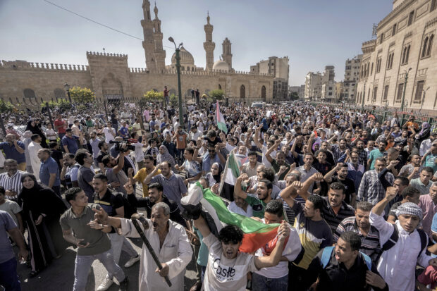 FILE - Protesters shout anti-Israel slogans during a rally to show solidarity with the people of Gaza after Friday prayers at Azhar mosque, the Sunni Muslim world's premier Islamic institution, in Cairo, Egypt, Friday, Oct. 20, 2023.