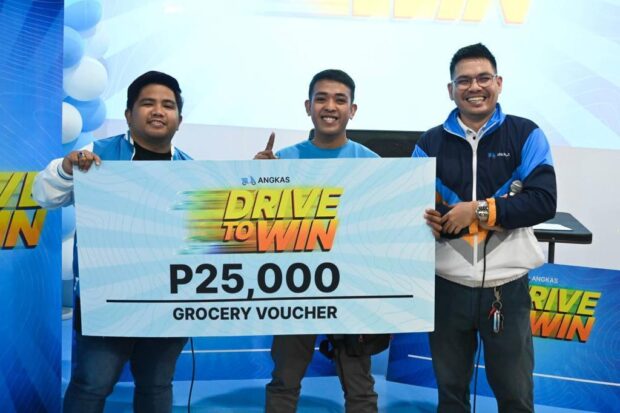 This photo shows Shaun Pineda, Randy Darilag Taguiam, and Raymond Macatangay, winners of P25,000 worth of groceries. Contributed photo