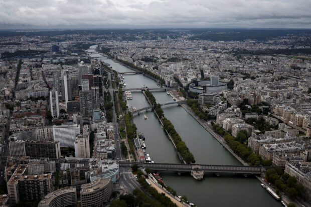 One person died and another was injured after an assailant attacked passersby near the Eiffel Tower in central Paris