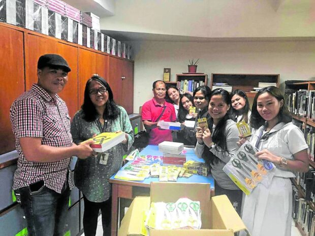 GIVING BACK Scholars of the Mindanawon Initiatives for Cultural Dialogue (Mindanawon) give out donations, mostly much-needed school supplies, for pupils of Sitio Cabagaayan and Mt. Apo Elementary School in Barangay Sibulan, Davao City. 