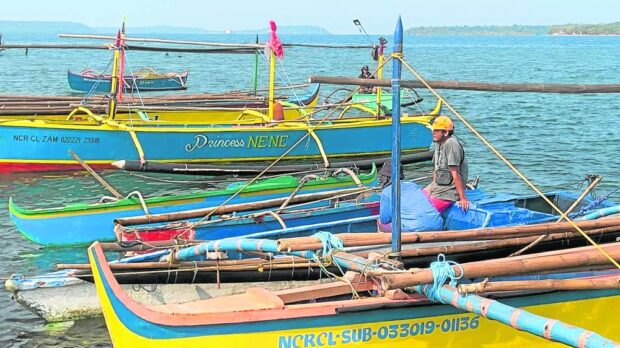 Filipino fishermen caught in debt net in South China Sea row