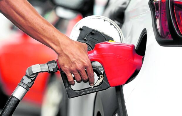 TEMPORARY RELIEF Motorists can take a breather as fuel prices drop this week. —Inquirer file photo