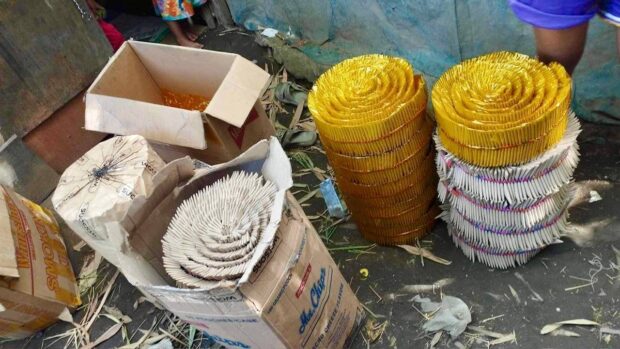 UNLICENSED Police seize firecrackers from a makeshift factory in San Ildefonso town, Bulacan, on Sunday for operating without permits and license, as authorities intensify their campaign against illegal makers of fireworks and pyrotechnic devices. —BULACAN POLICE PHOTO ban firecrackers dilg