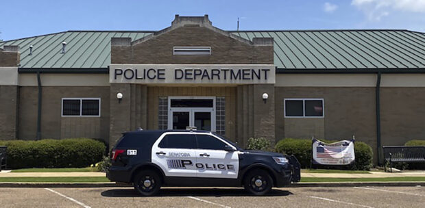 This image provided by The Tate Record shows a Senatobia Police vehicle in front of the Senatobia, Miss., Police Department on Jan. 27, 2021. The mother of a 10-year-old child who was sentenced by a Mississippi judge to three months’ probation and a book report for urinating in public, has refused to sign his probation agreement and will ask for the charge against her son to be dismissed, the family's attorney announced Tuesday, Dec. 19, 2023. (The Tate Record via AP)