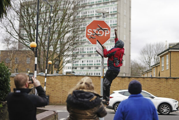 Banksy's stop sign artwork was allegedly stolen and London police said the suspected thief of the piece has been arrested.
