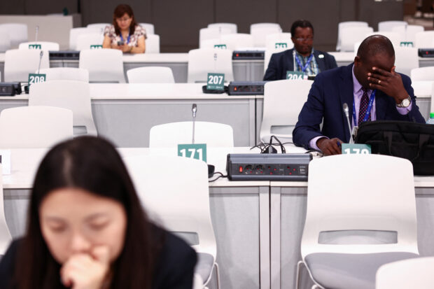COP28 heads for overtime as draft fossil fuel deal divides nations