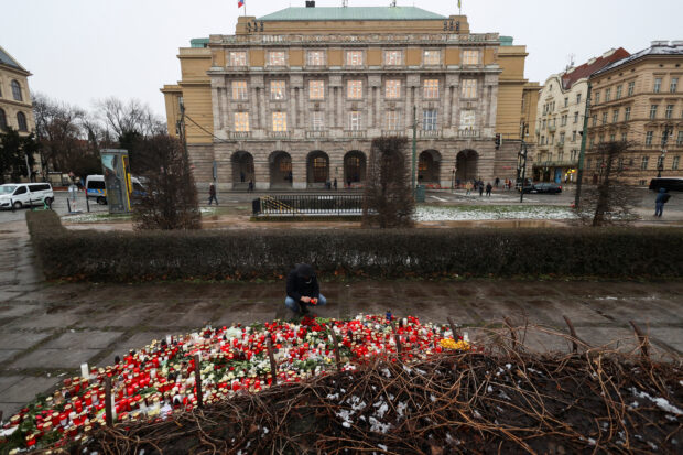 People observe national mourning day to honour the victims of the Prague shooting