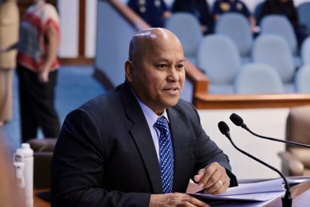 DELA ROSA DEFENDS PNP REORGANIZATION BILL: Sen. Ronald “Bato” Dela Rosa, during the interpellation period on Senate Bill No. (SBN) 2449 which seeks to provide organizational reforms in the Philippine National Police (PNP), defends a provision in the measure that transfers the power to designate chiefs of police from mayors and governors to the PNP chief. According to Dela Rosa, the authority should be left to the head of the PNP because the chief knows who is fit for the position. “I know this will be difficult, but we have to take the bitter pill,” Dela Rosa said on Tuesday, December 12, 2023. (Voltaire F. Domingo/Senate Social Media Unit) icc